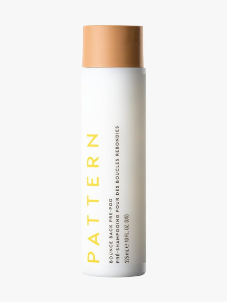 Pattern Beauty Bounce Back Pre-Poo white bottle with orange cap on light gray background