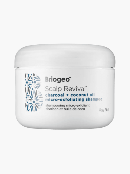 Scalp Revival Charcoal + Coconut Oil Micro-Exfoliating Shampoo in branded white jar on light gray background